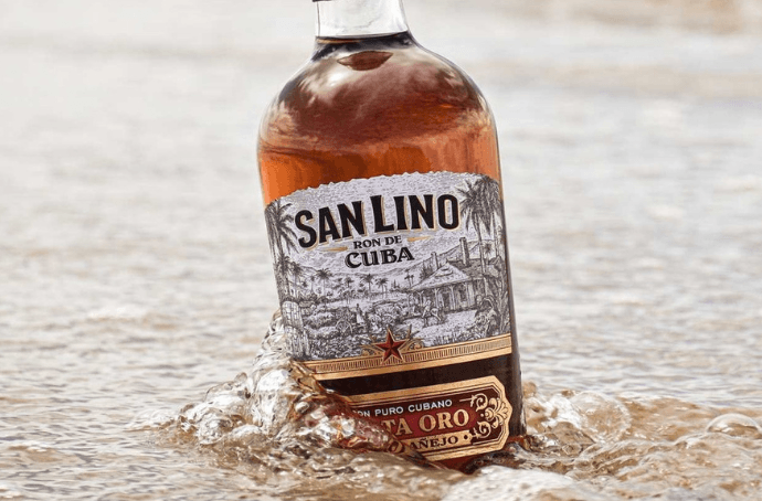 SAN LINO CARTA ORO BOTTLE EMERGING FROM THE OCEAN